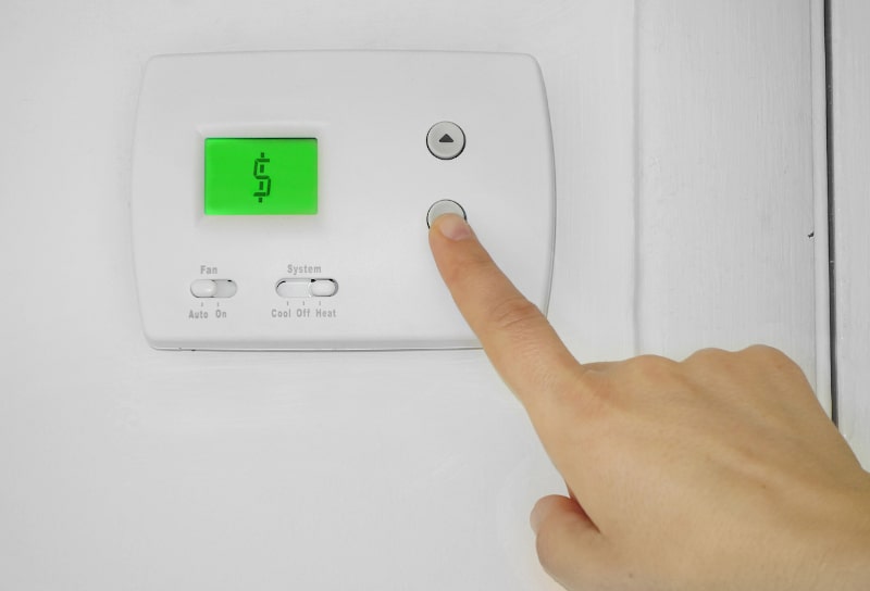 https://www.bryansunited.com/wp-content/uploads/2022/04/thermostat-with-dollar-sign.jpg